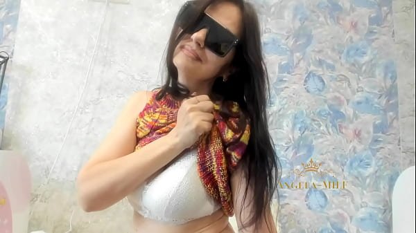 Sexy dark haired MILF in sunglasses gets horny and starts masturbating her hairy pussy while she’s home alone / Angela-MILF